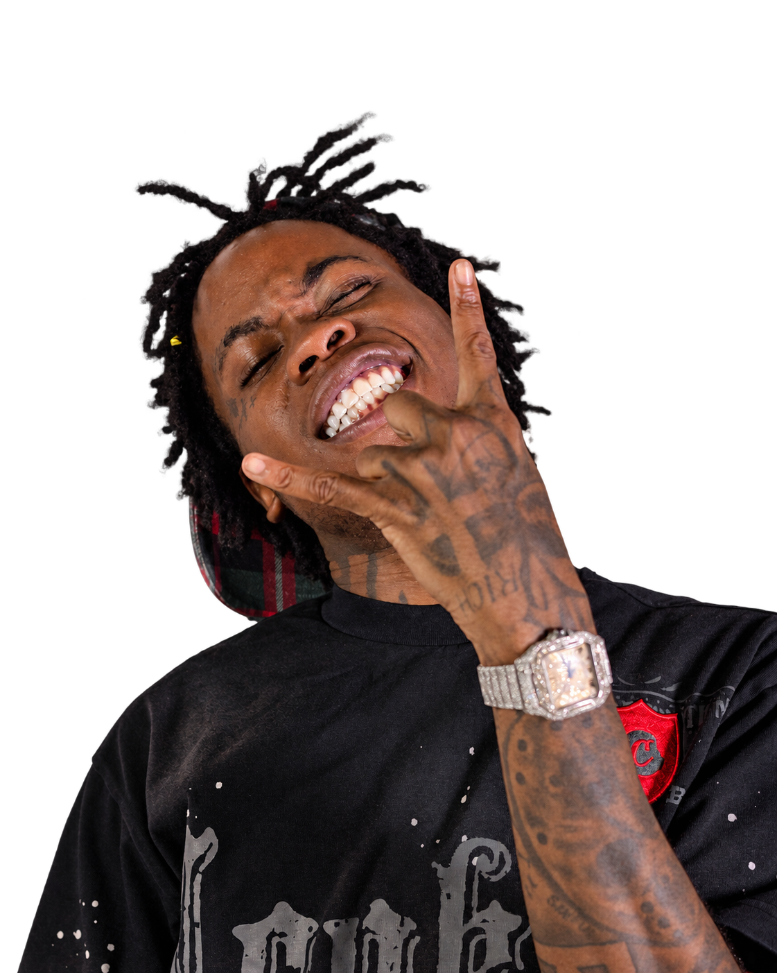 RajahWild in a black graphic shirt, smiling with a rock gesture and a diamond watch